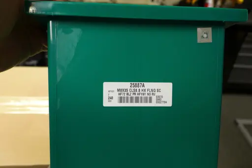 No room for error: An Endries parts bin carries a bar code and two RFID tags (one appears at upper right). No room for error: An Endries parts bin carries a bar code and two RFID tags. Photo: David Tenenbaum