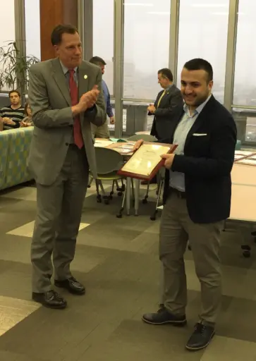Raed Al Kontar accepts the UW-Madison Teaching Assistant Award for Early Excellence in Teaching.