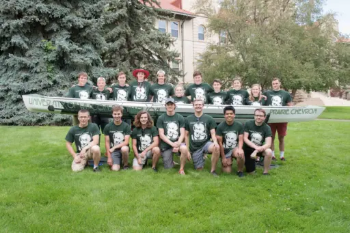 Students with their boat