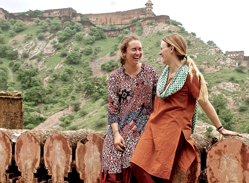 Photo of Kayla Huemer and Hannah Lider in India