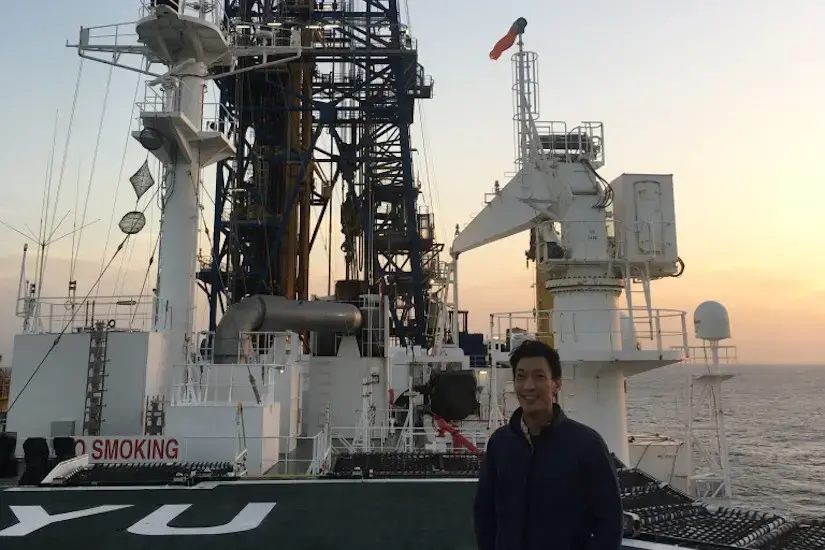 Hiroki Sone standing the drilling vessel
