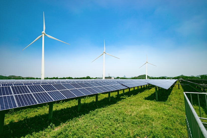 Stock photo of solar panels and wind generators