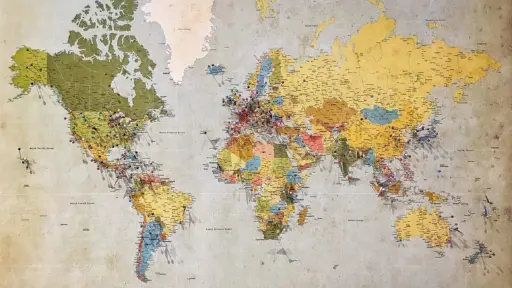 Global map with push pins in various locations