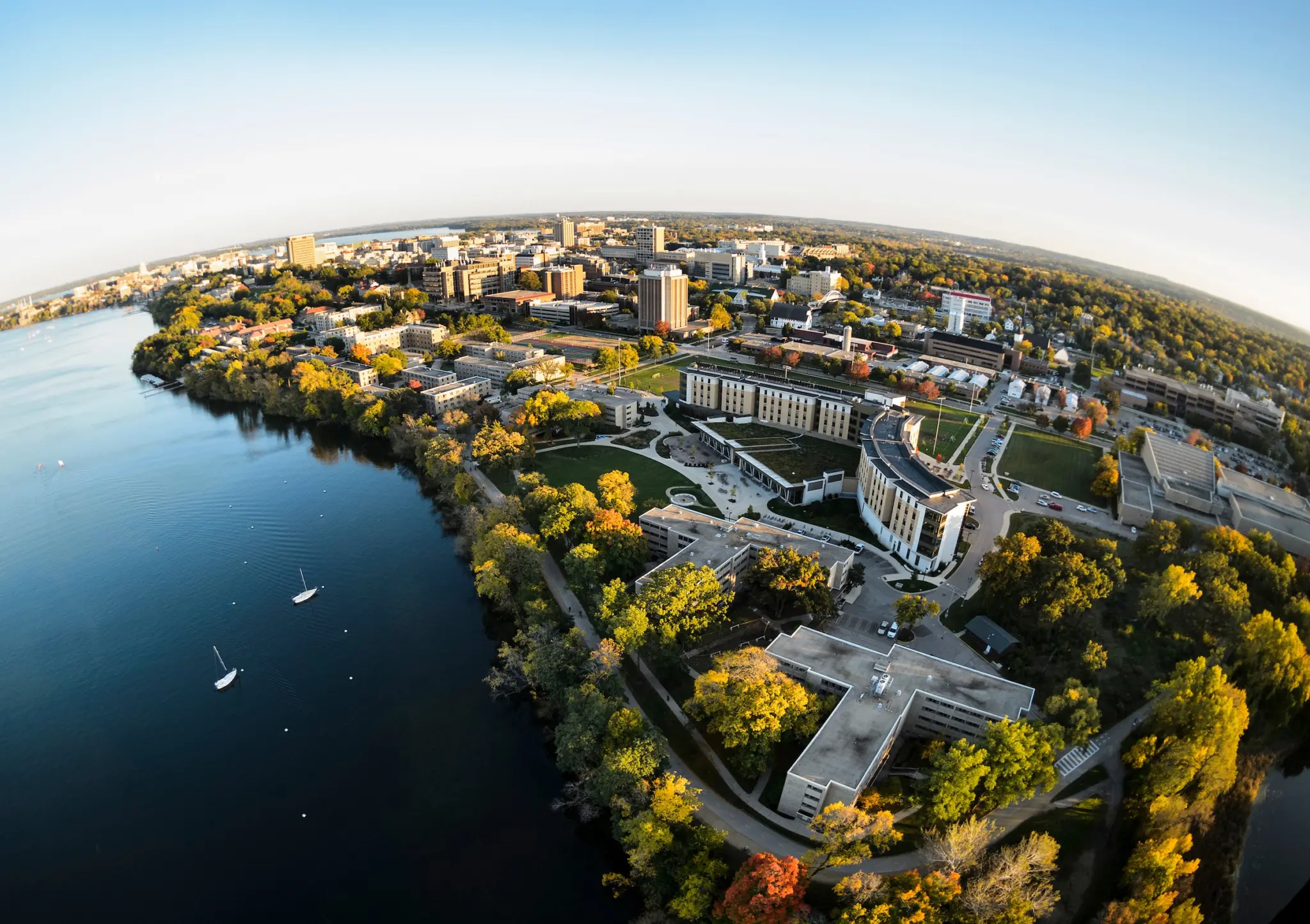 Aerial photo of campus buildings along lake
