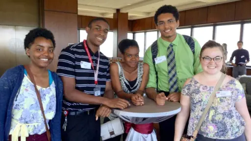 Four Engineering Summer Program participants pose for the camera.