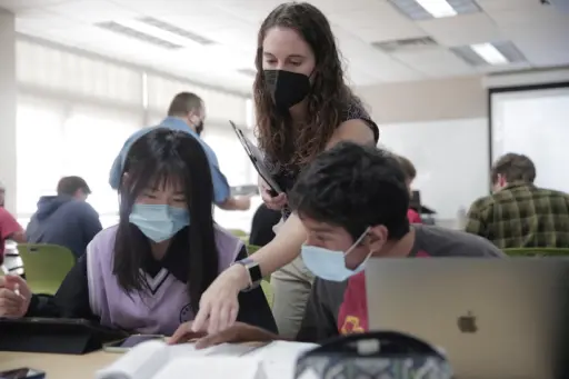 Hannah Blum with students