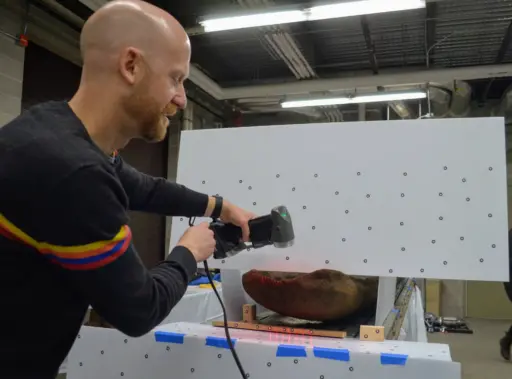 Lennon Rodgers scans the canoe