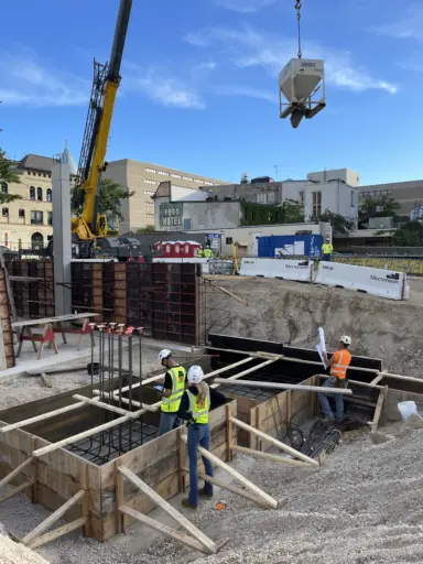 Engineers doing a pre-pour inspection of rebar before concrete is poured.