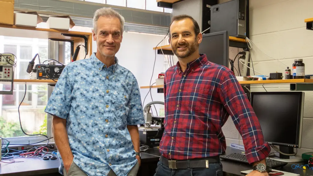 Daniel van der Weide and Marcos Martinez in lab