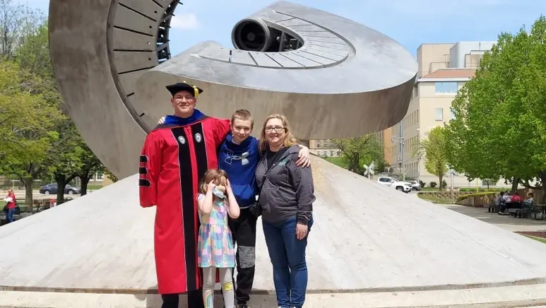 Erick Oberstar and family at his Spring 2021 PhD commencement