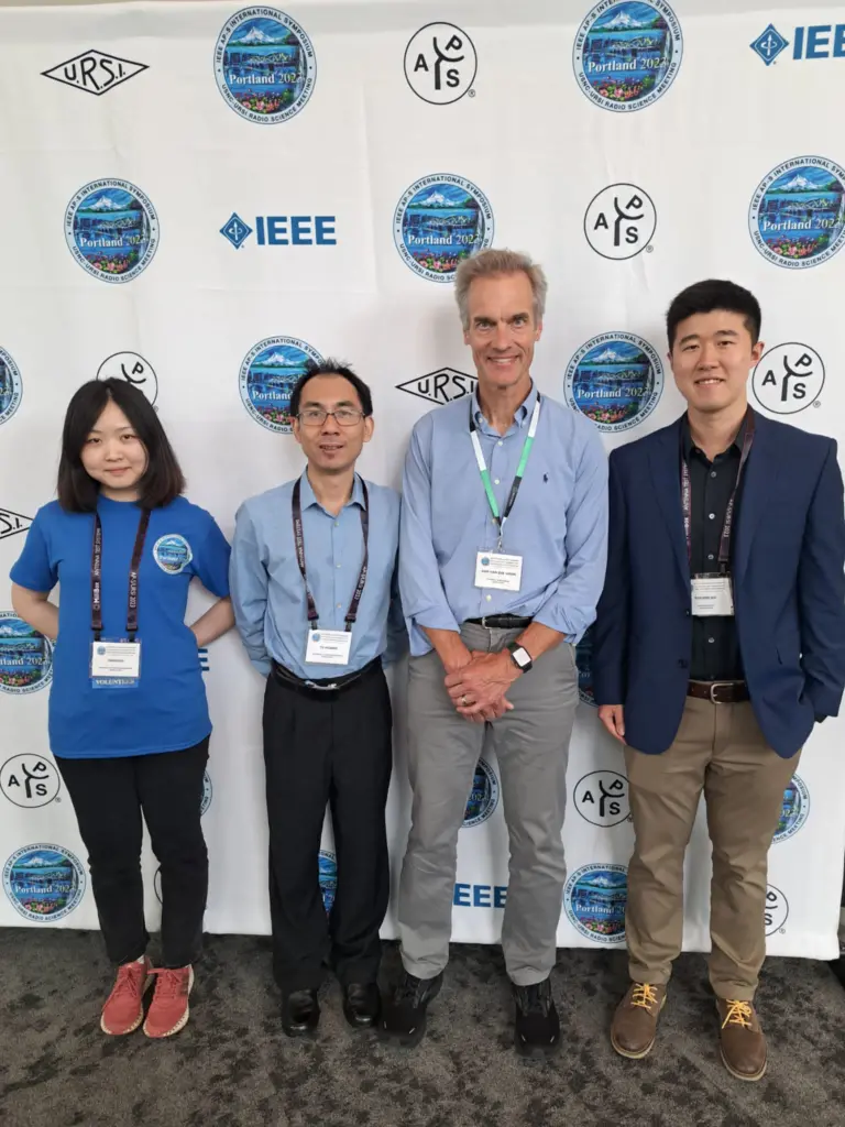 ECE Professor Dan van der Weide and three colleagues at IEEE Conference