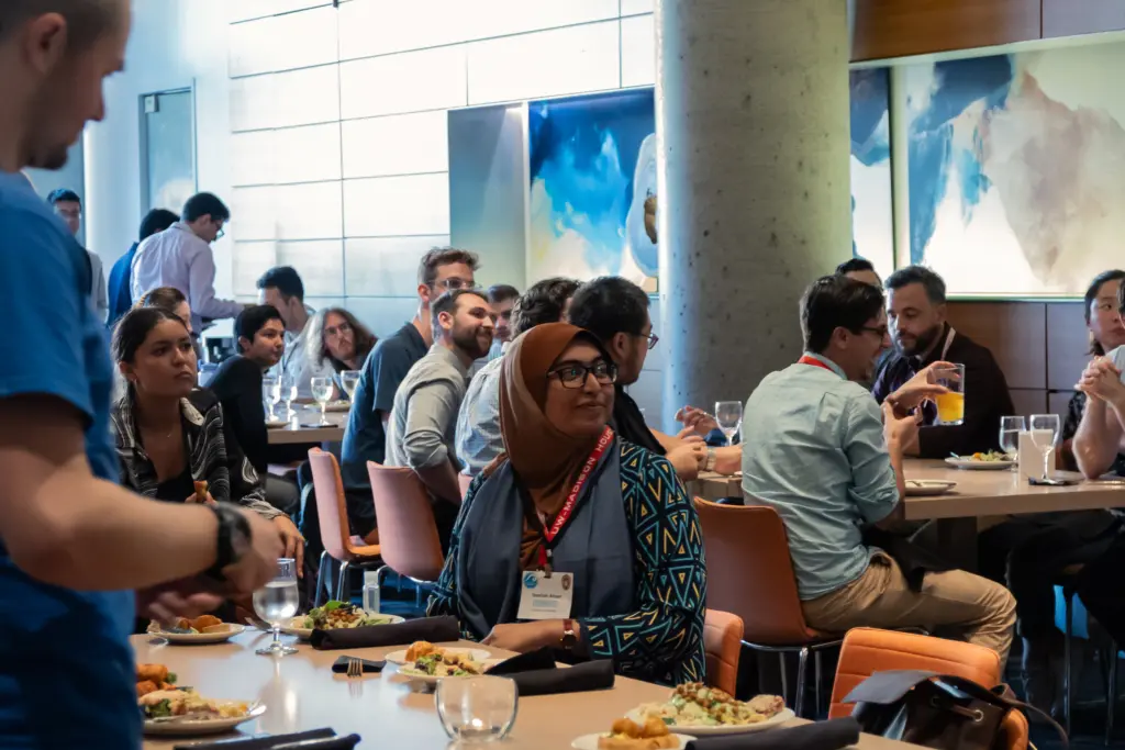 Graduate students dine during presentation awards at the Young Coastal Scientists and Engineers Conference - Americas