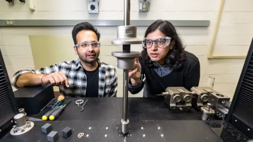 Pavana Prabhakar and PhD student Hridyesh Tewani testing material in the lab