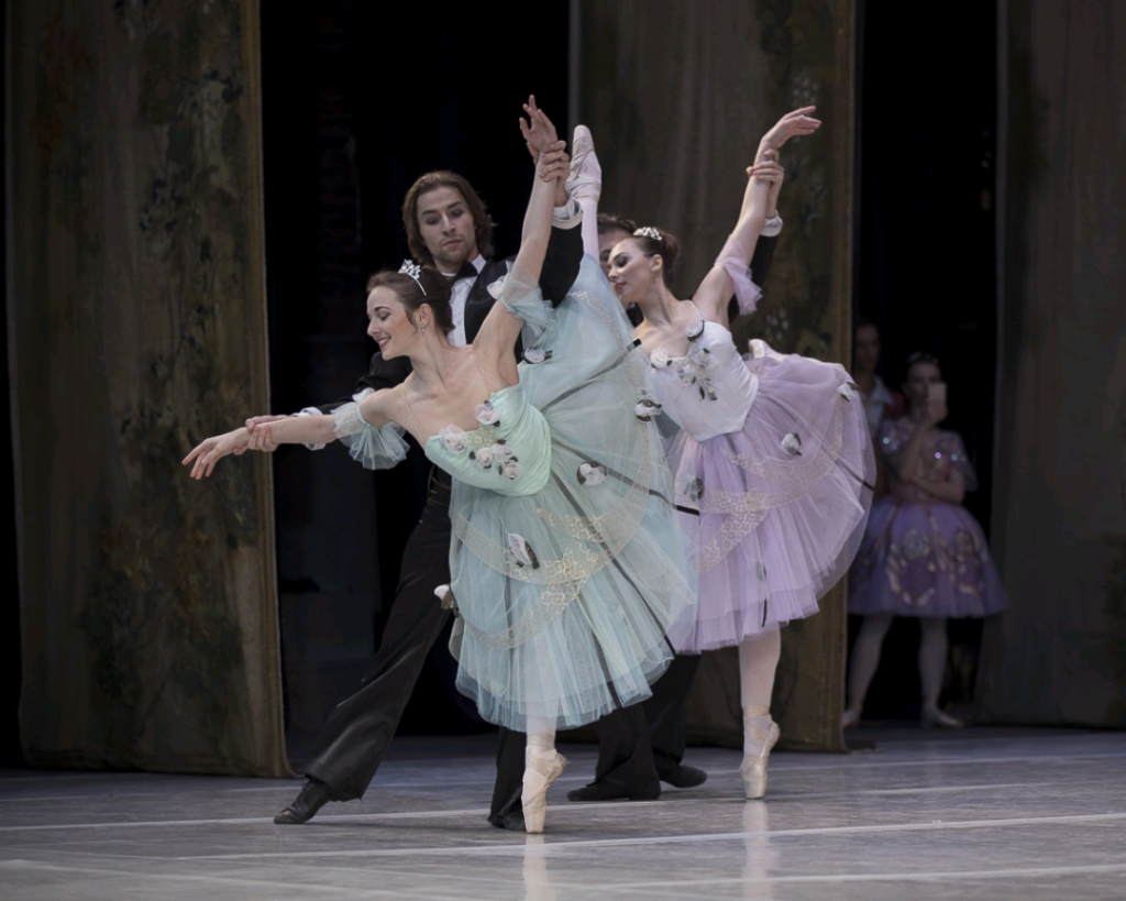 Bianca Navari on stage with fellow ballet dancers.