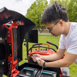 Zhaohui Liang works on a control unit