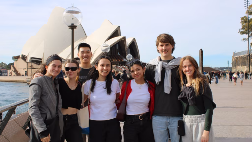 NEEP PhD Student Isabella Wood poses in front of the Sydney Opera House with students she met during the 2025 Nuclear Innovation Bootcamp.