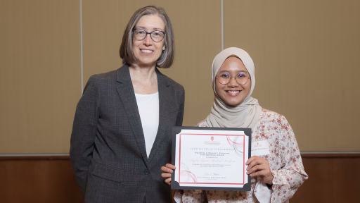 Susan Hagness standing next to scholarship recipient