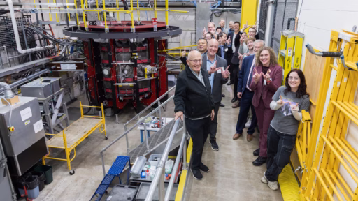 Stephanie Diem, nuclear engineering and engineering physics assistant professor, gives forum attendees a tour of her Pegasus-III fusion energy lab—part of the clean energy interest area.