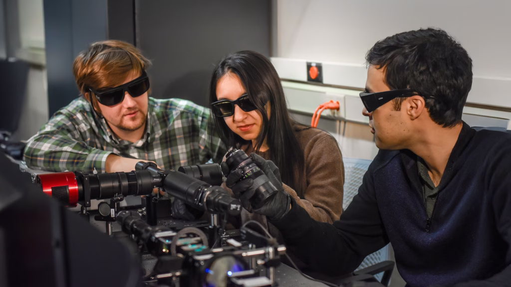 Researchers use equipment in the lab of Professor Mikhail Kats, led by PhD student Rabeeya Hamid