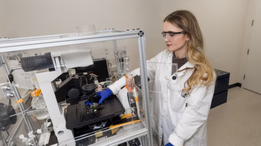 PhD student Molly McCord works in the lab