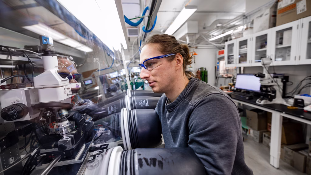 Daniel Rhodes works on a project in the lab