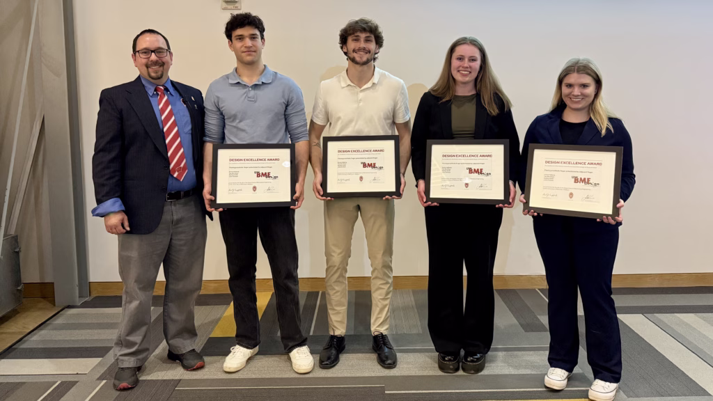 Design Excellence Award Junior winning team: Flexing prosthetic finger potentiated by adjacent finger