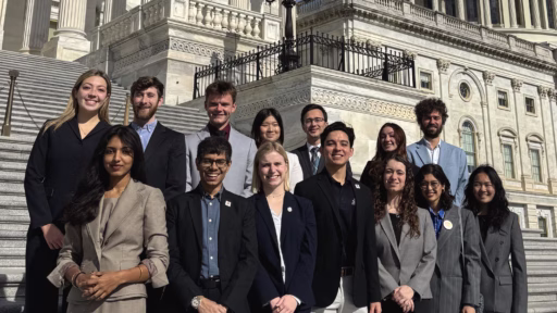 The 2026 Fusion Student Delegation poses for a group picture in front of the U.S. capitol building on the last day of their program.