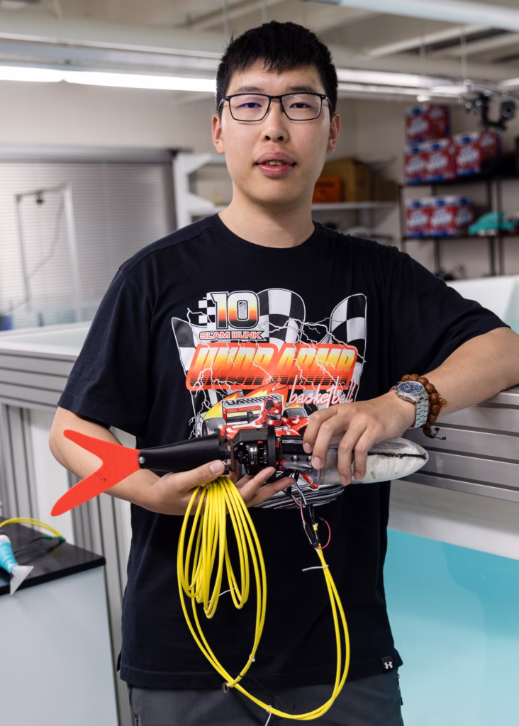 PhD student Jiayi Jin with a robotic flying fish