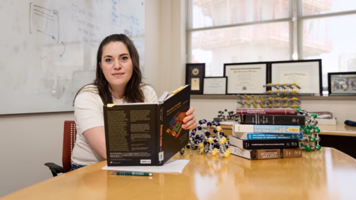 Rose Cersonsky sits at table in her office.