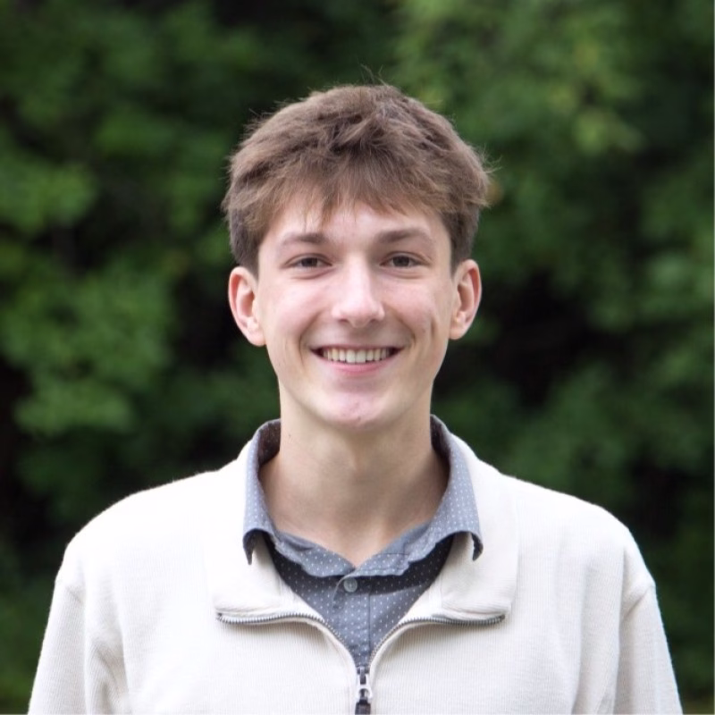 Professional headshot of Alec Brey