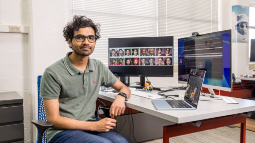 Graduate student Guruprasad Viswanathan Ramesh at desk in Fawaz lab.