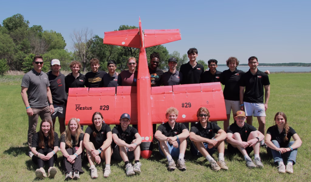 SAE Aero 2026 Team with red plane
