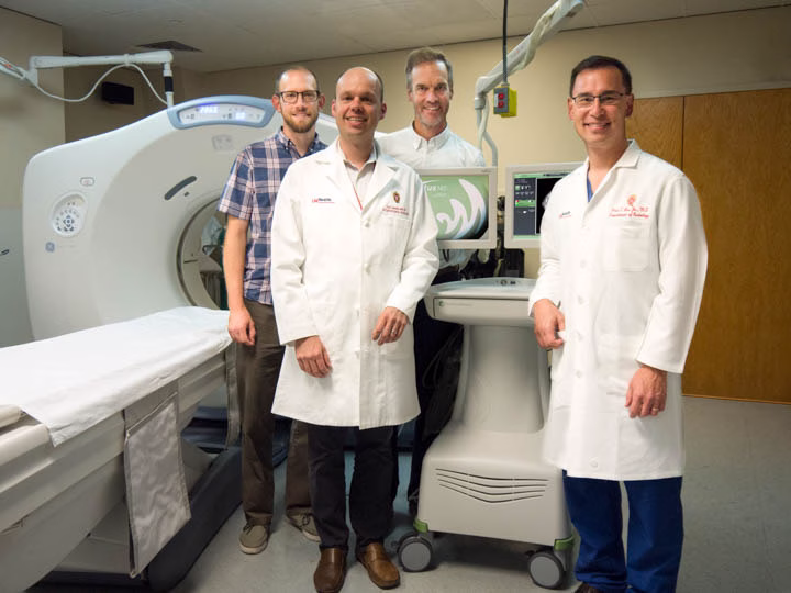 UW-Madison researchers Chris Brace, Paul Laeseke, Daniel van der Weide, and Fred Lee Jr.