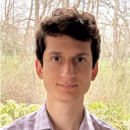 Headshot of Alex Bocchieri, a recent PhD graduate from the University of Wisconsin–Madison