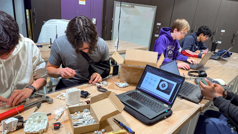 Members of the Humanoid Robotics Club working together